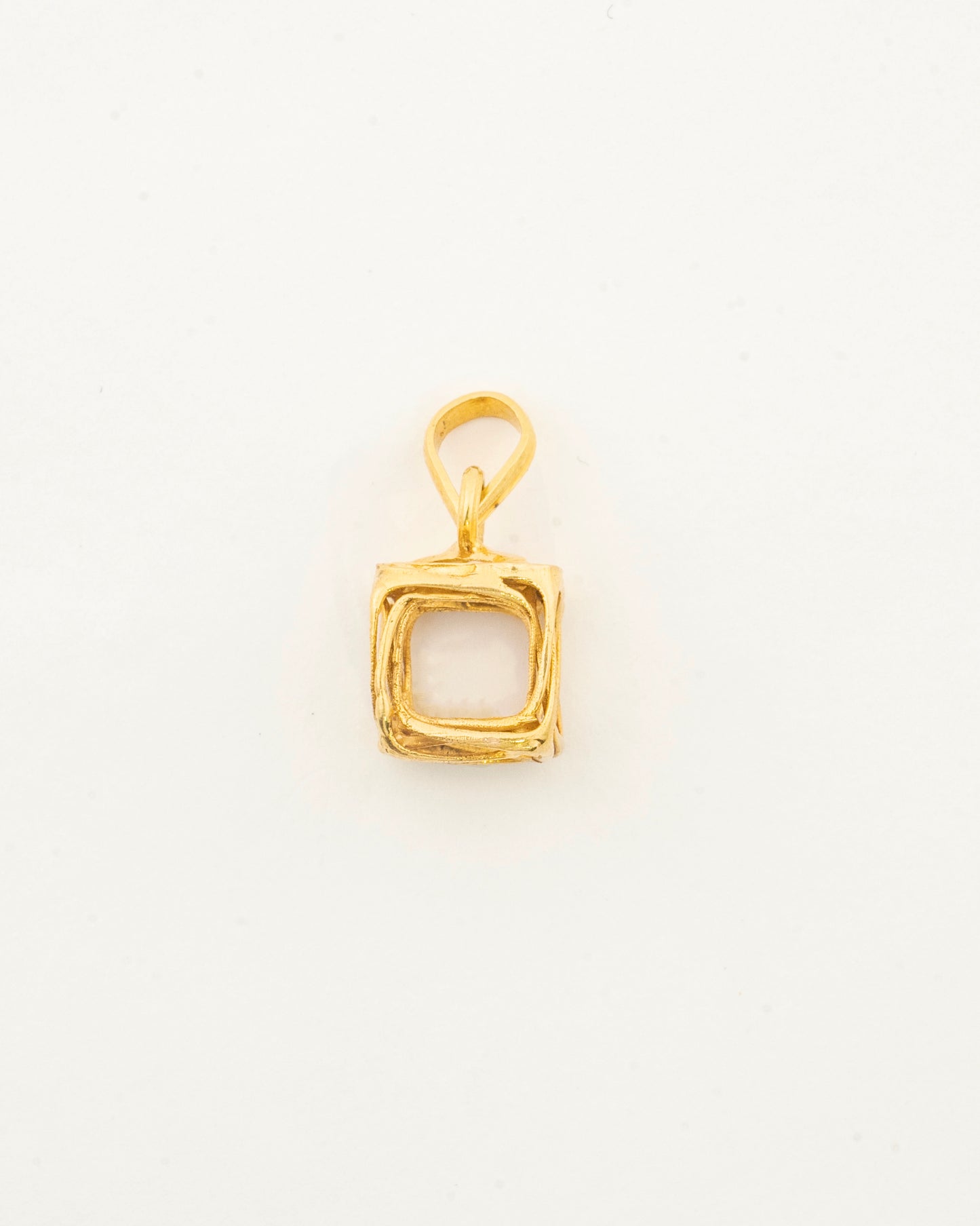 Front view of the Sculptyx Vertex Vault 18K gold pendant showcasing its modern architectural geometric silhouette.