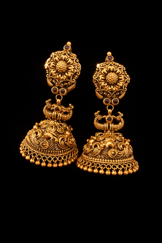 22K Gold Floral Peacock Temple Jhumka earrings with ruby stone accents and antique finish.