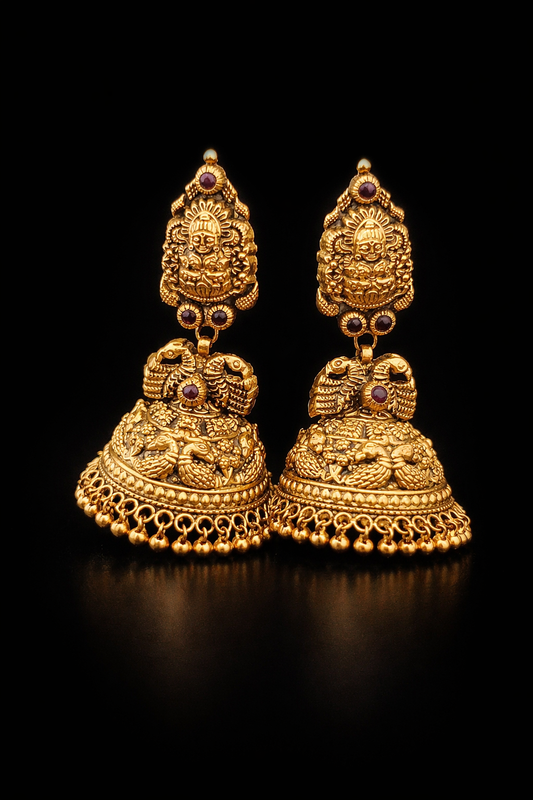 22K Gold Lakshmi Bird Temple Jhumka earrings with ruby stone accents and antique finish.