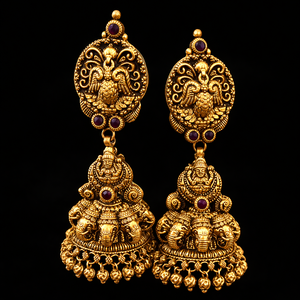 22K Gold Lakshmi Elephant Peacock Temple Jhumka earrings with ruby stone accents and antique finish.