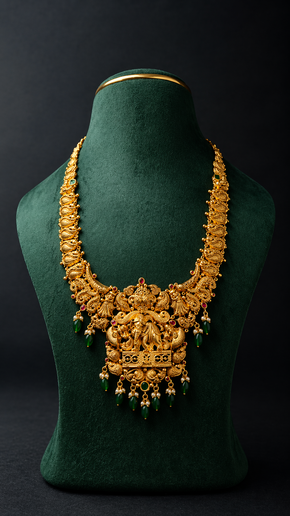 Handcrafted lightweight 22K Gold Lakshmi Elephant Temple Haram necklace with peacock motifs, ruby accents, and green bead drops.