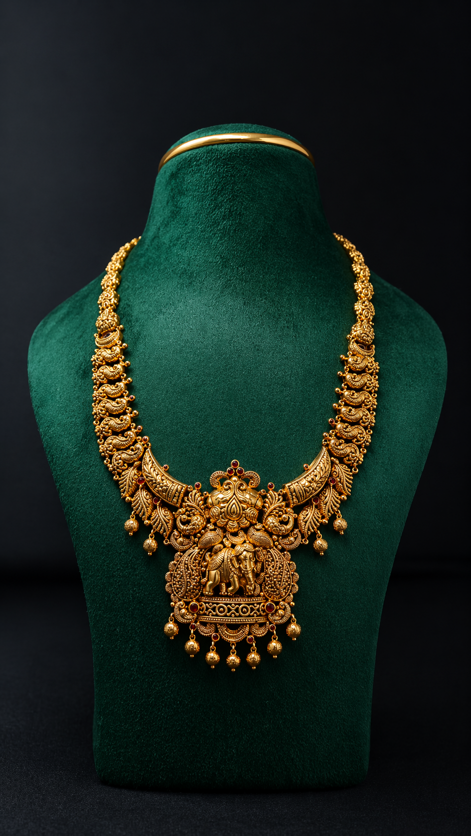 Handcrafted 22K Gold Peacock Elephant Temple Haram necklace with Nakshi detailing, elephant motifs, and traditional South Indian bridal craftsmanship.
