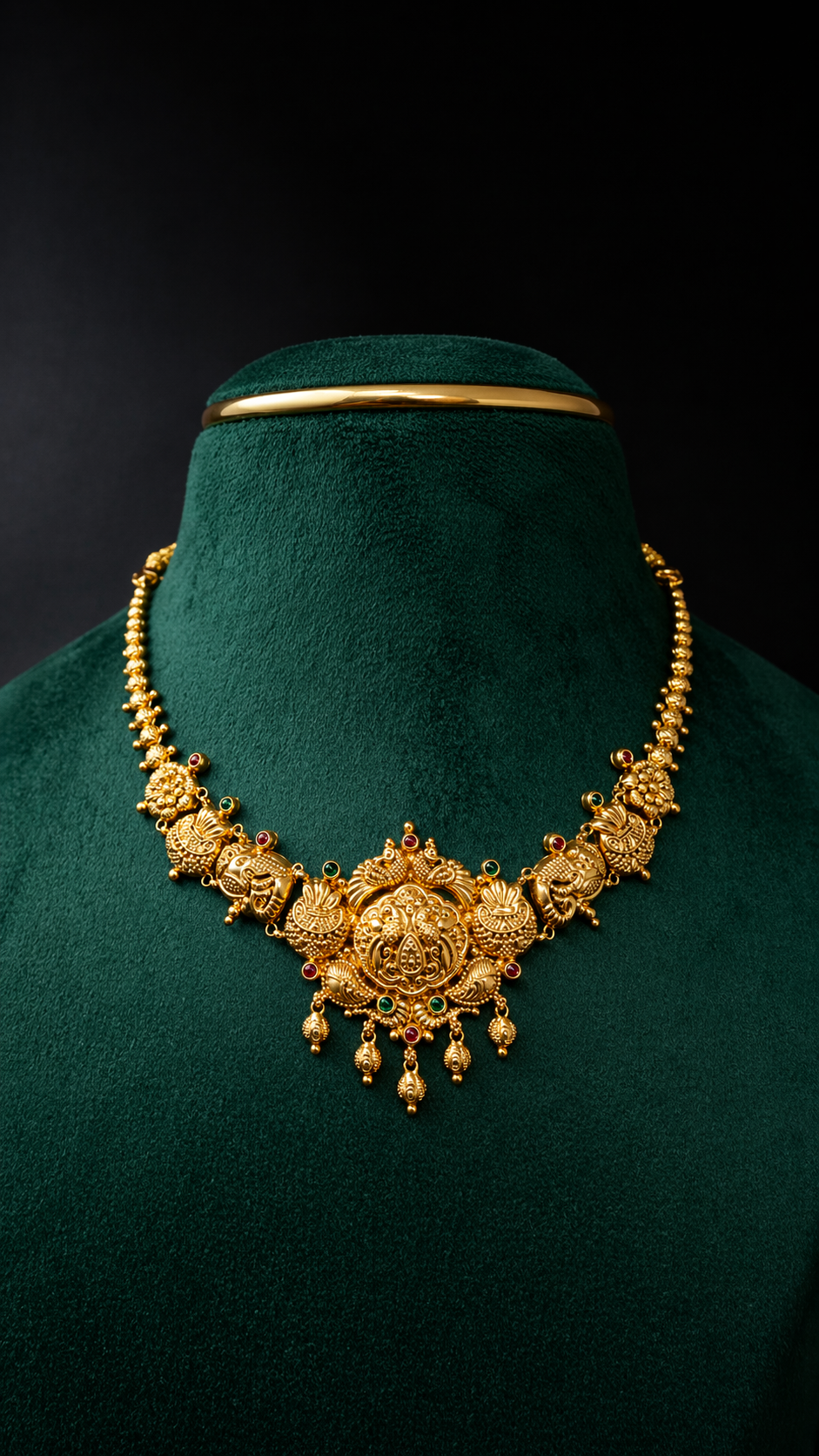Lightweight 22K gold Lakshmi heritage short necklace with traditional South Indian temple-inspired detailing and coloured decorative accents.