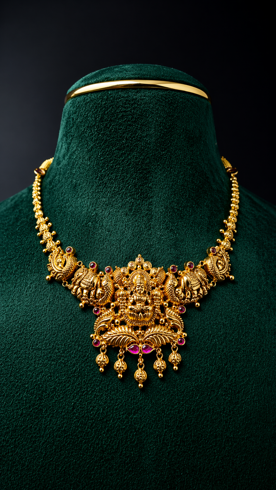 Lightweight 22K gold Lakshmi peacock short necklace with traditional red and green stone detailing in a South Indian jewellery design.