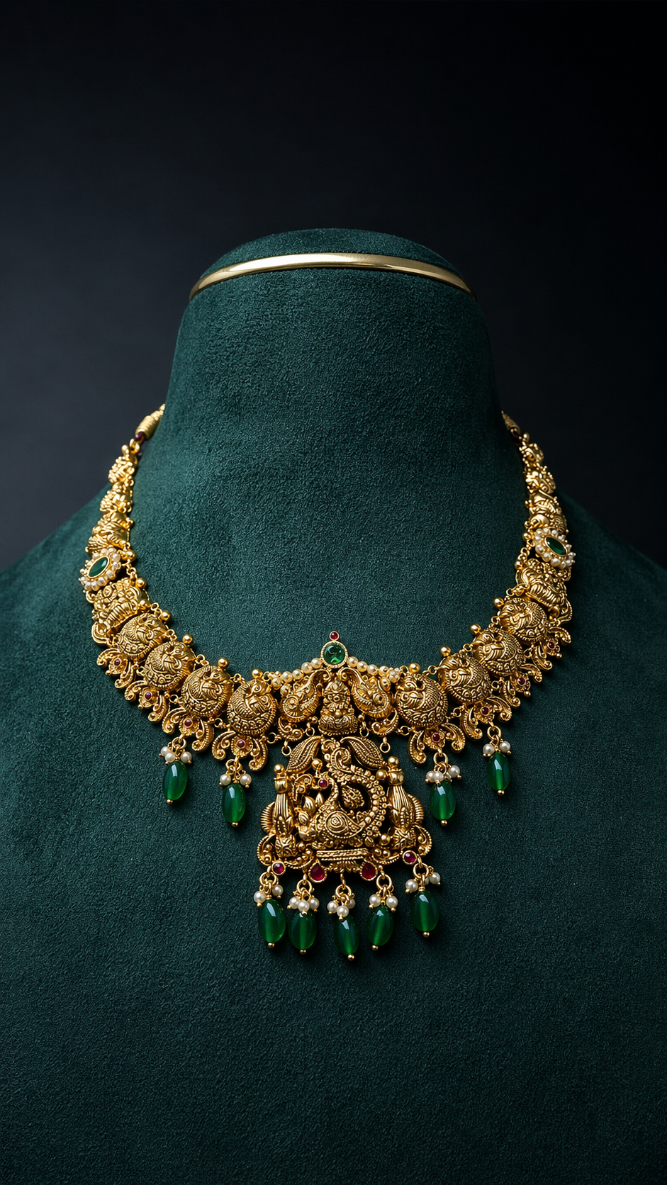 Lightweight 22K gold Lakshmi temple necklace featuring a peacock pendant, decorative coloured accents, and traditional South Indian craftsmanship.