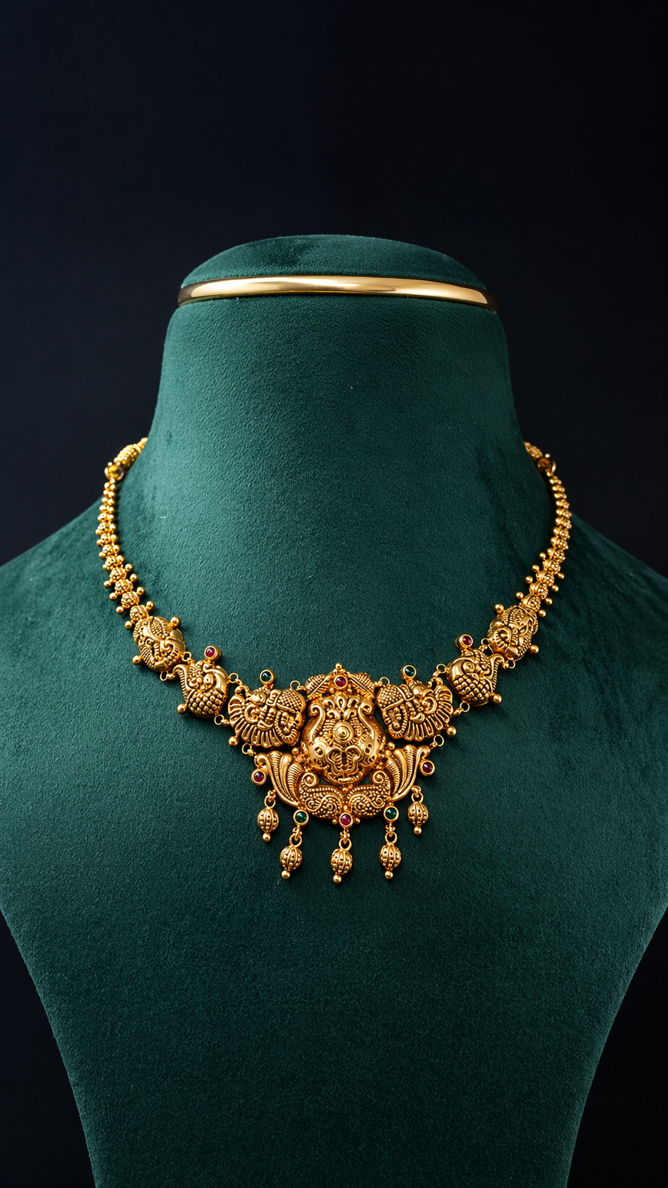 Lightweight 22K gold peacock heritage short necklace with traditional coloured stone accents in a South Indian jewellery design.
