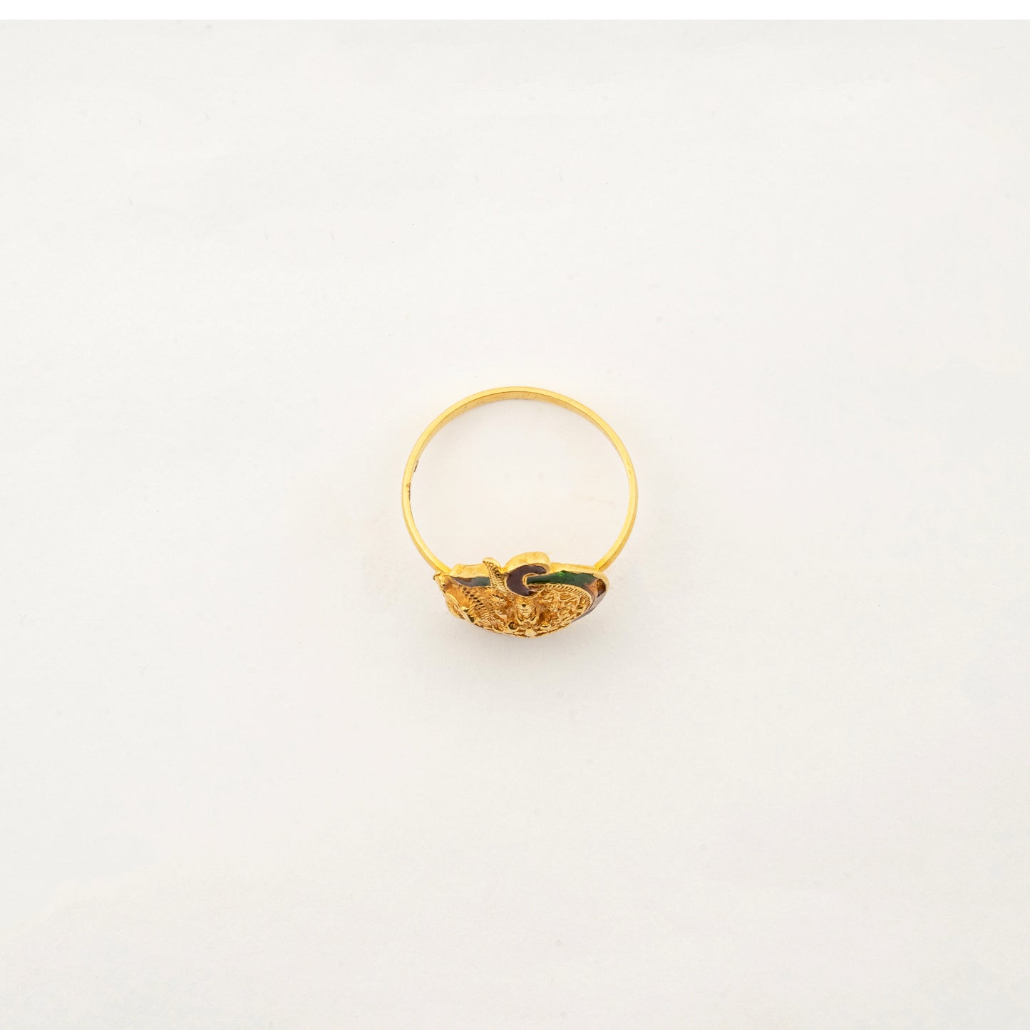 Side view of the handcrafted 22K gold Lakshmi ring by Sculptyx displaying its refined band and devotional craftsmanship.