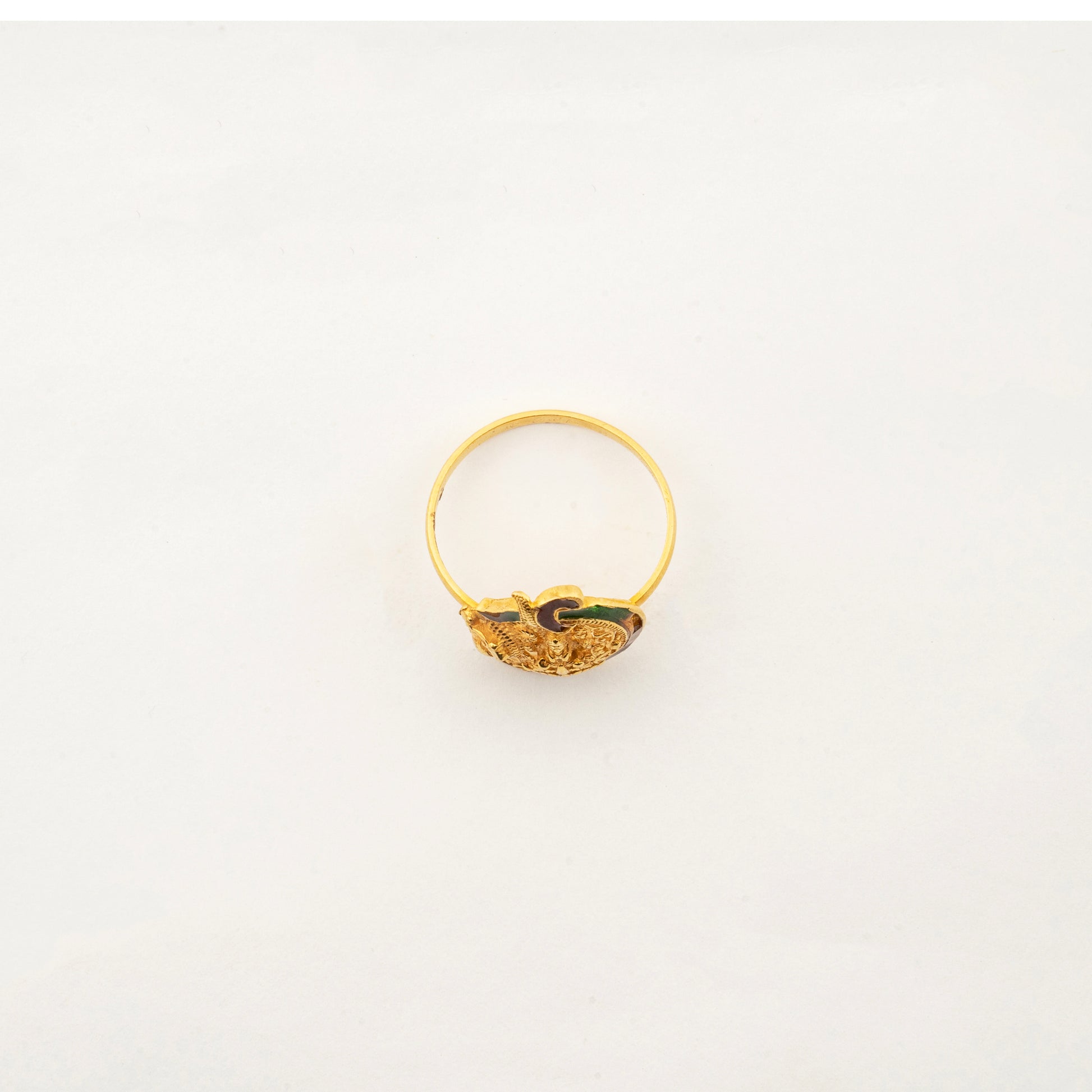 Side view of the handcrafted 22K gold Lakshmi ring by Sculptyx displaying its refined band and devotional craftsmanship.