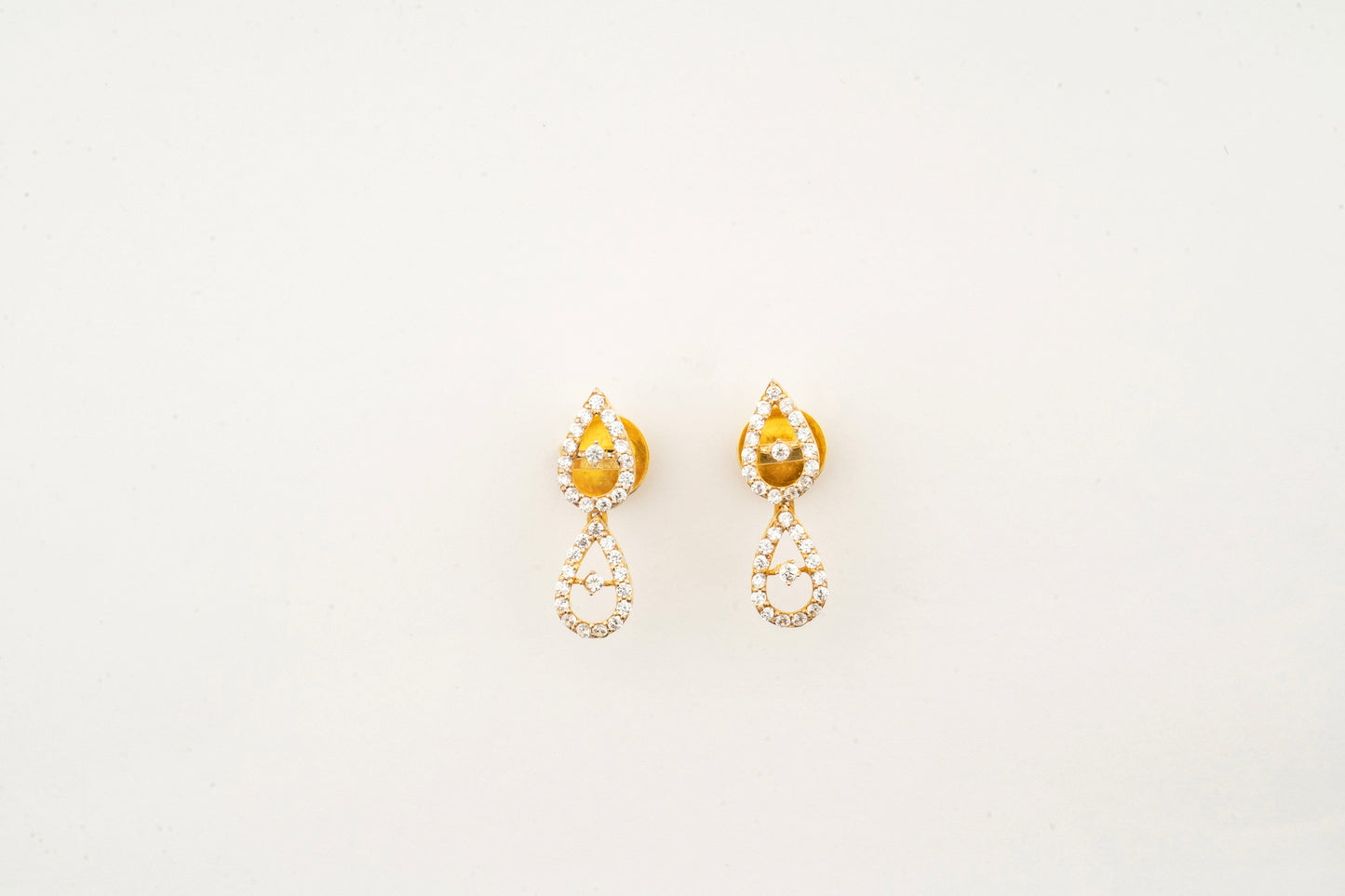 Sculptyx Celestial Drops handcrafted 18K gold crystal drop earrings featuring elegant teardrop Swarovski crystal accents.