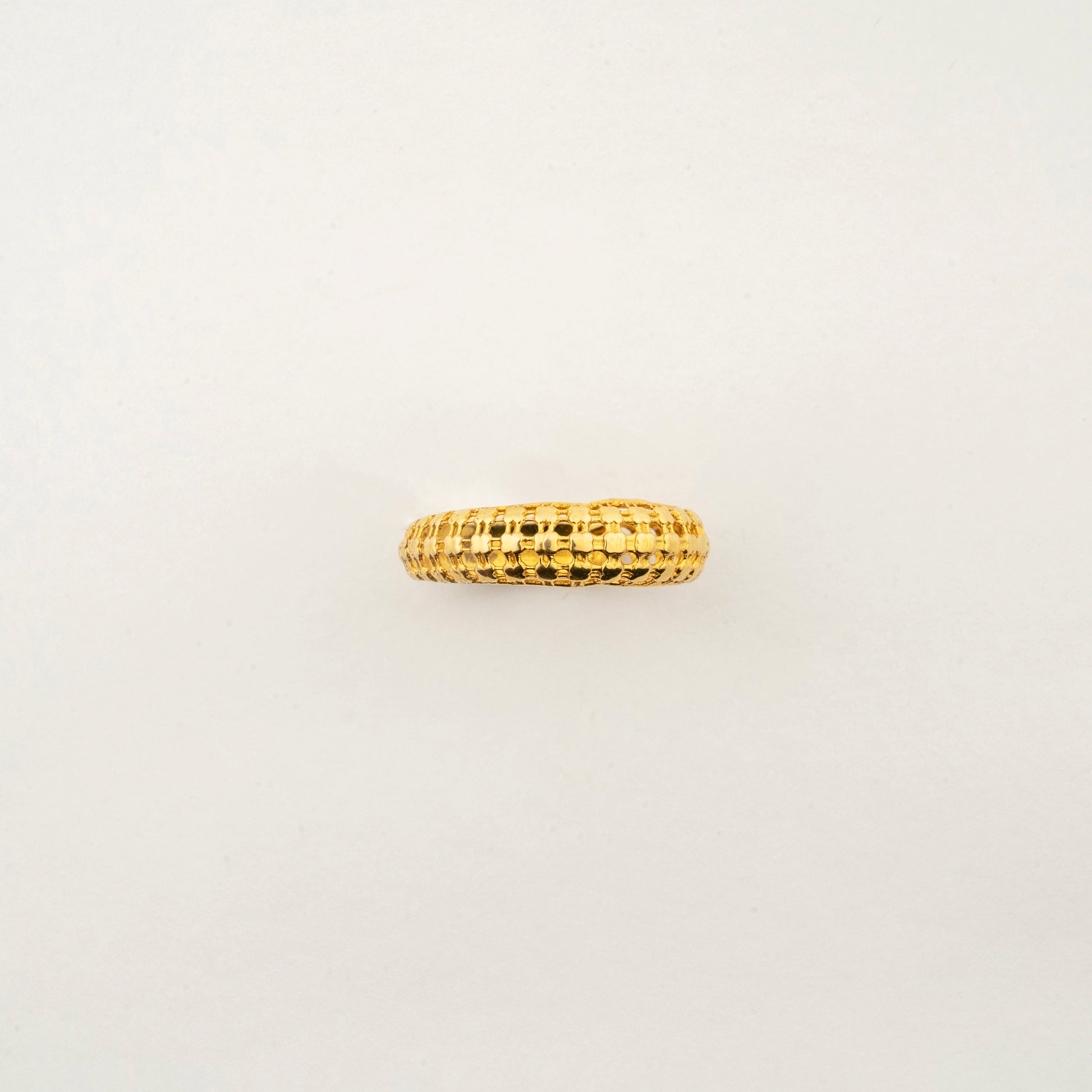 Sculptyx Corda Flare handcrafted 18K gold textured band ring featuring an intricate woven surface with contemporary elegance.