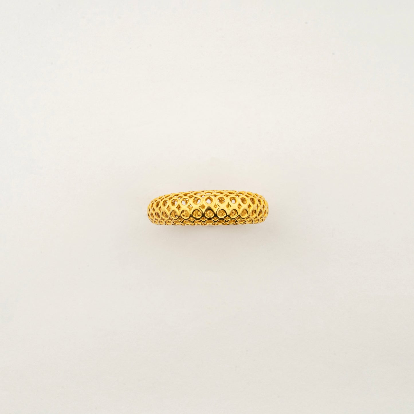 Sculptyx Domaris Solis handcrafted 18K gold domed textured band ring featuring a refined woven surface and contemporary design.