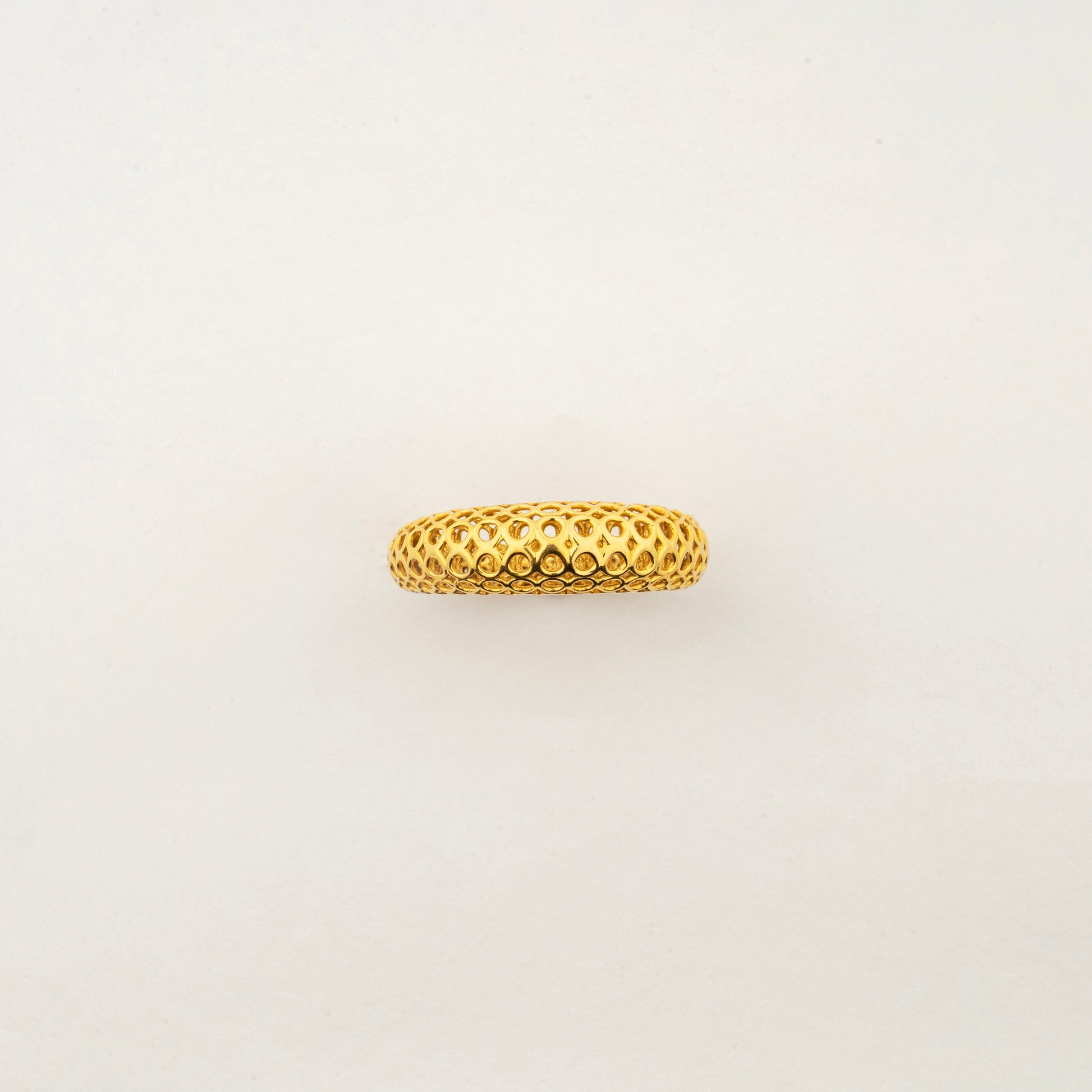 Sculptyx Domaris Solis handcrafted 18K gold domed textured band ring featuring a refined woven surface and contemporary design.