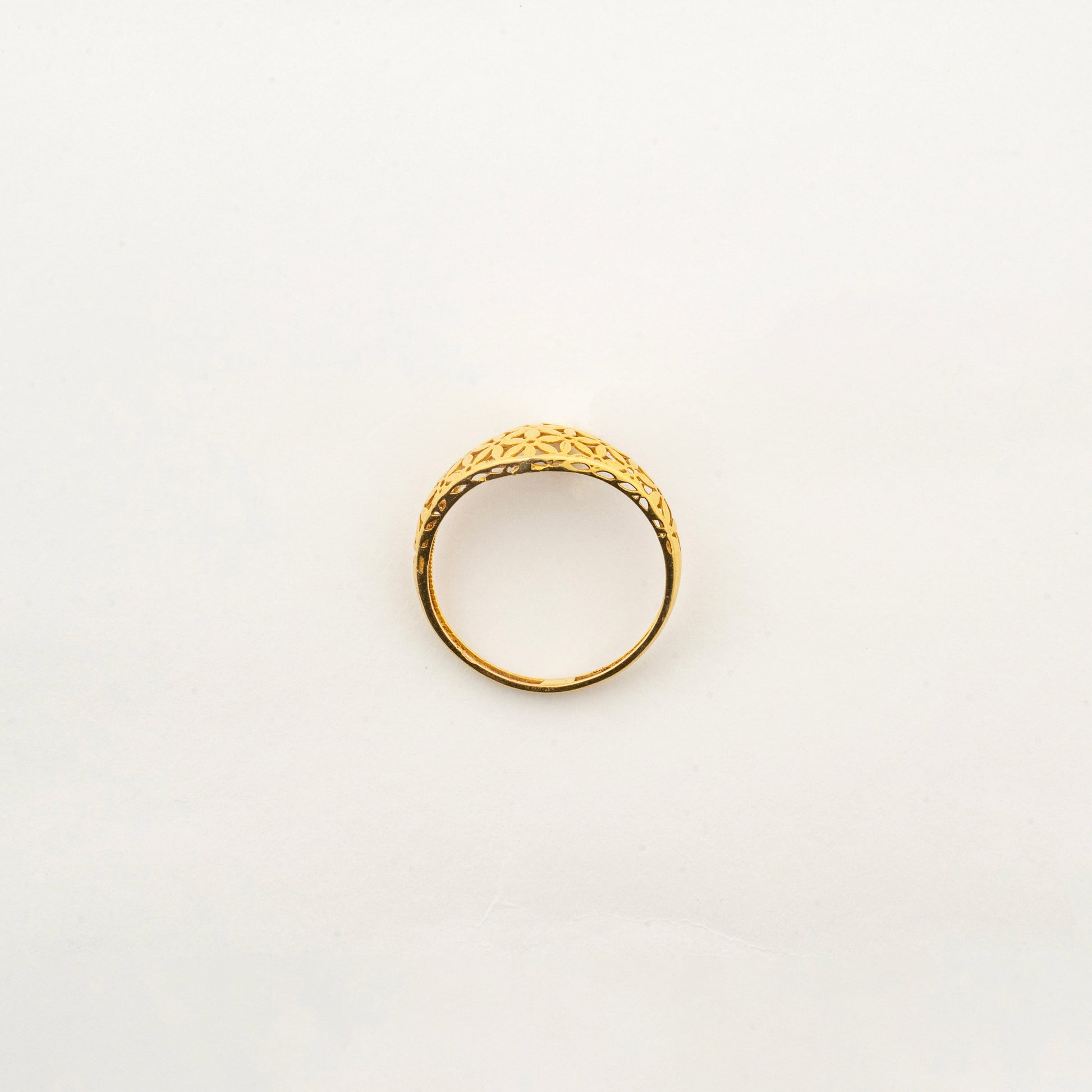 Front view of the handcrafted Sculptyx Florentis Lumea 18K gold ring showcasing its refined geometric silhouette.