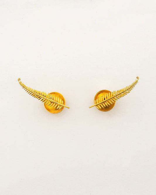 Sculptyx Frondelle handcrafted 18K gold botanical stud earrings inspired by elegant fern leaves and nature.