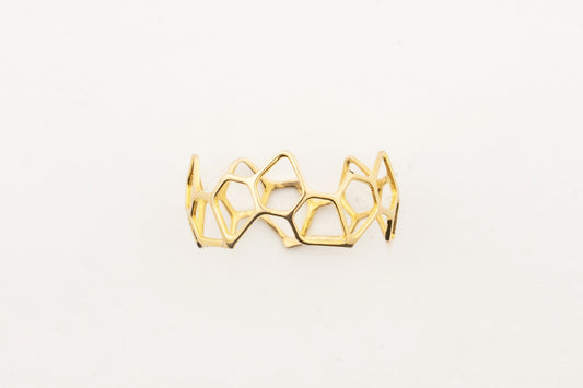 Sculptyx Hivemind handcrafted 18K gold geometric statement ring featuring an open honeycomb-inspired contemporary design.