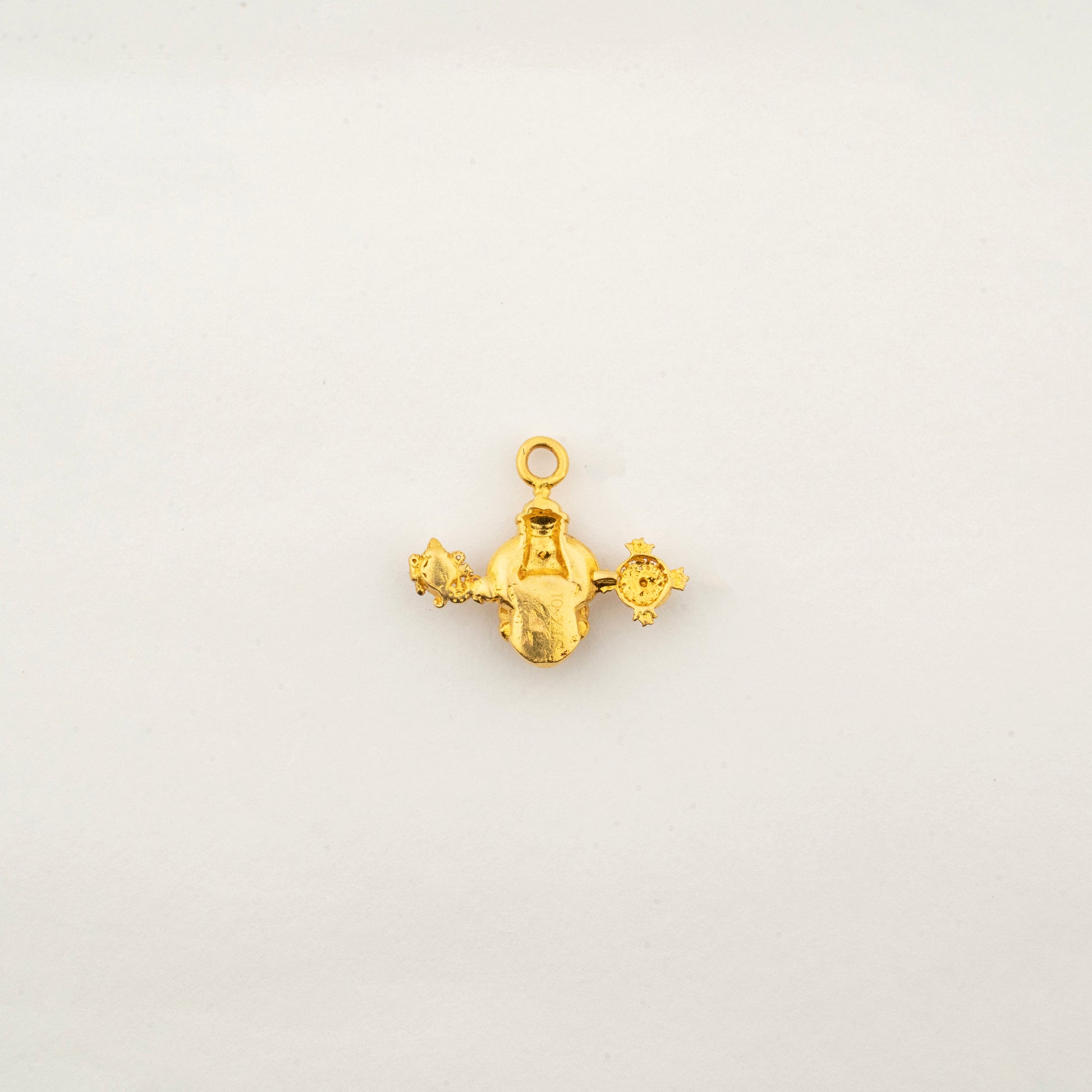 Close-up of the handcrafted 22K gold Lord Venkateshwara pendant by Sculptyx with intricate sacred detailing.