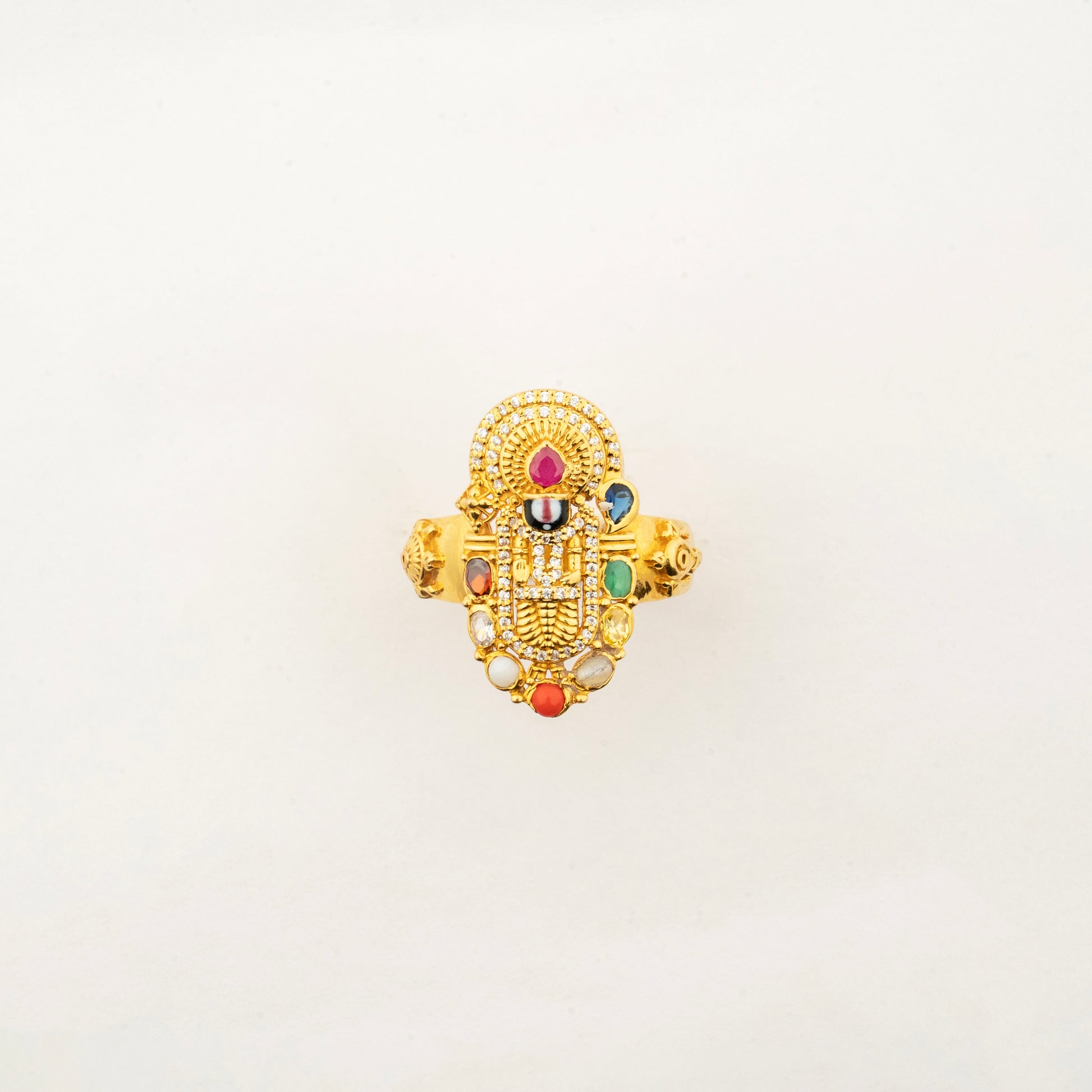 Sculptyx Navaratna Balaji Men's Ring handcrafted in 22K gold featuring Lord Balaji surrounded by traditional Navaratna gemstones in an intricate devotional design.