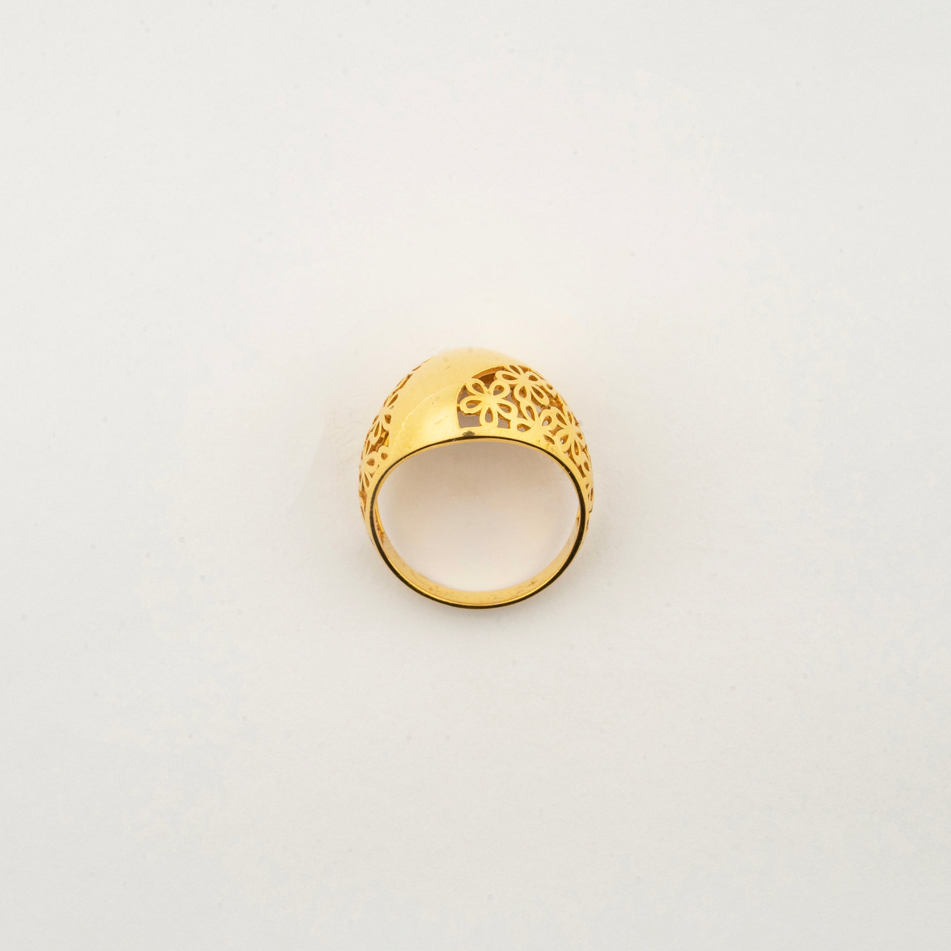 Front view of the Sculptyx Noctis Bloom 18K gold floral statement ring.