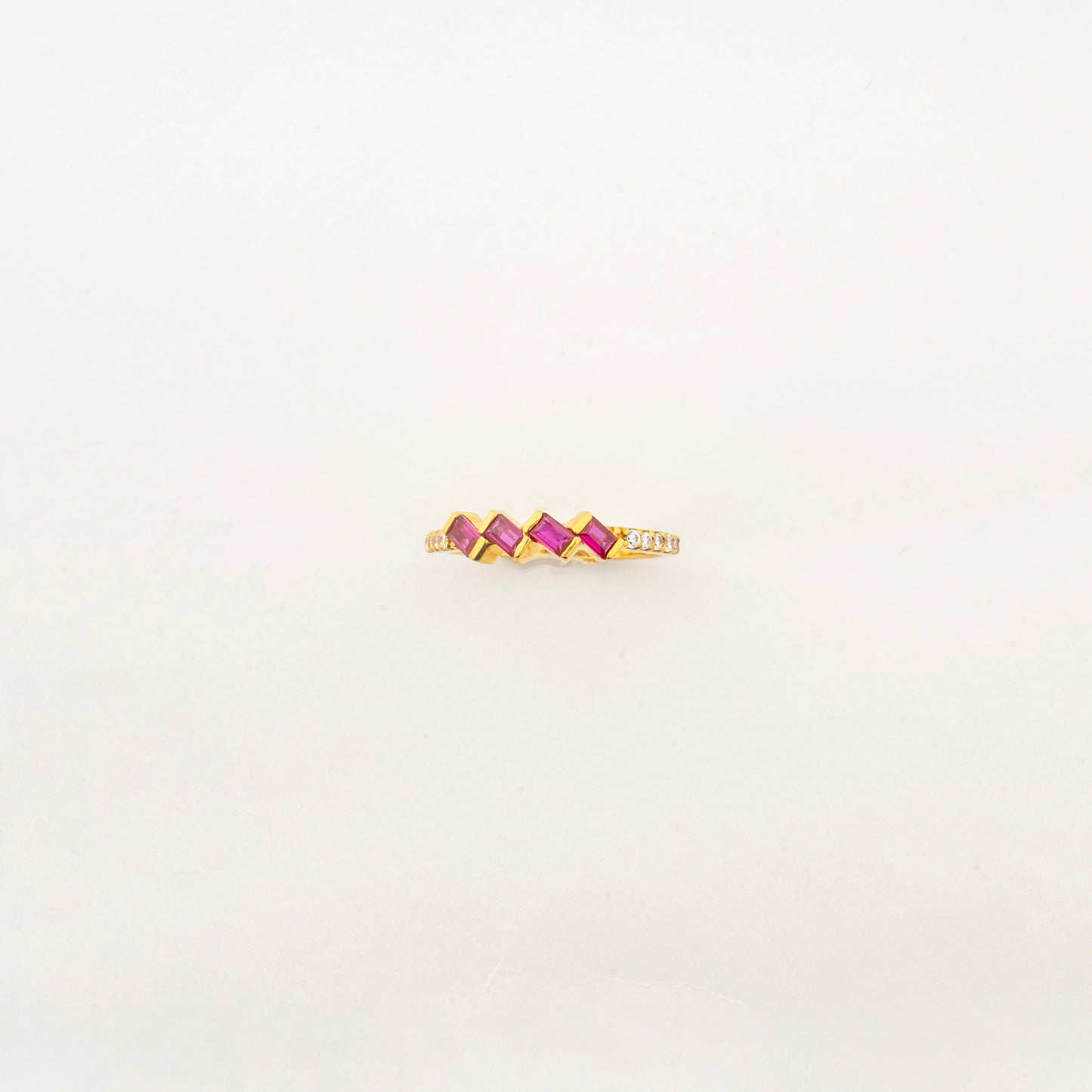 Side profile of the Sculptyx Rubra Cascade 22K gold ruby ring showcasing its elegant low-profile gemstone setting.