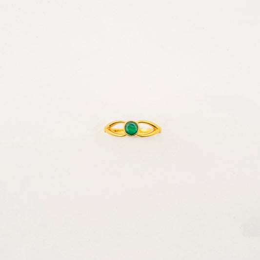 Sculptyx Verdant Axis handcrafted 22K gold emerald statement ring featuring a vibrant green gemstone in a modern minimalist setting.