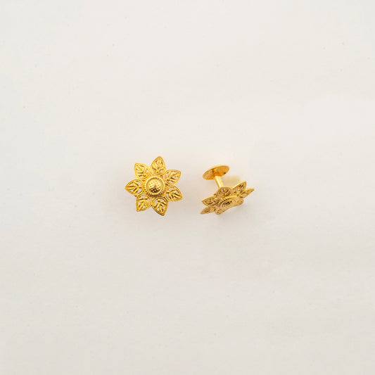 Sculptyx Verdelis Six handcrafted 18K gold botanical leaf stud earrings featuring six sculpted petals inspired by natural foliage.